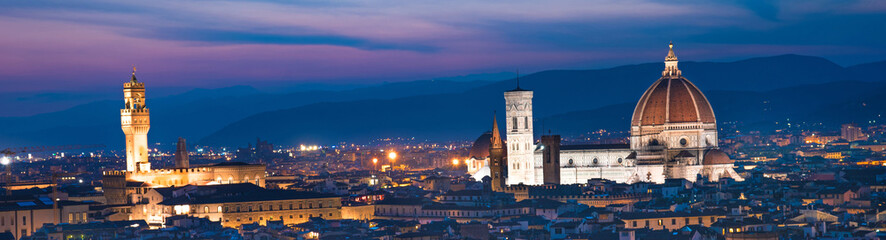 A fabulous panoramic view of Florence from Michelangelo Square in the evening lights. It is a pilgrimage of tourists and romantics. Duomo Cathedral. Italy, Tuscany