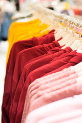 Christmas decoration with Christmas gold and red balls hanging on white snowflakes tree background.