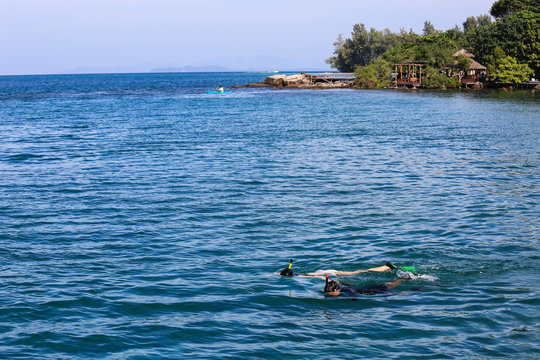 couple snorkeling in the sea at southern of thailand