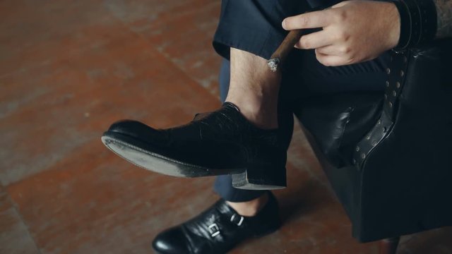 Brutal handsome man with ciga