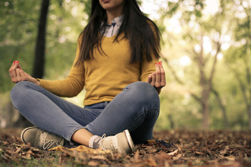 Young woman exercise yoga in nature.
