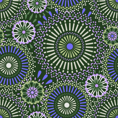 Seamless pattern with mandalas in the African style.