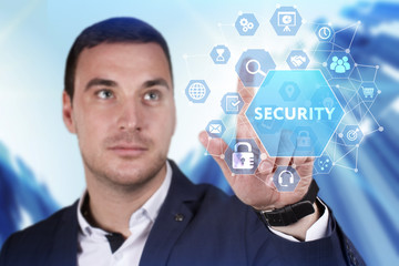 Business, Technology, Internet and network concept. Young businessman working on a virtual screen of the future and sees the inscription: Security