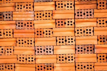 Orange brick used in construction architecture, background texture