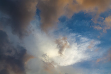 Blue sky and moving clouds.
