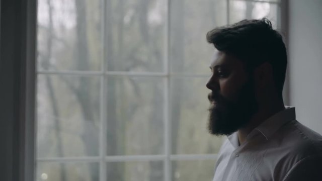 Brutal handsome man with ciga