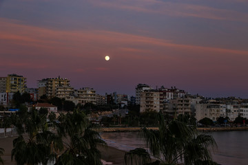 Cityscape at Mediterranean Sea at sunset