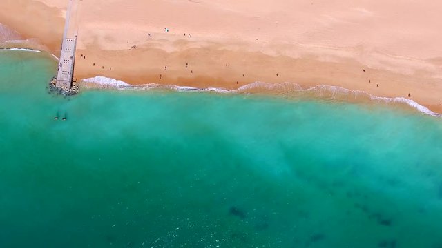 Aerial. Flight of the drone over beach of Albufeira portugal