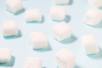 Marshmallow candy on blue