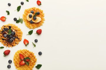 Waffles with fruits, breakfast background