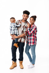 Obraz premium Full length portrait of a loving young african family