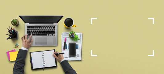 Office workplace with laptop, notebook, hand, office supplies, on khaki background. Solution, business planning, financial analysis, accounting, start up or working flat lay top view concept.