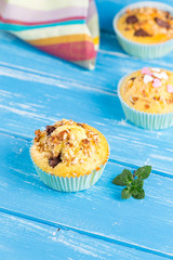 Fresh muffins with nuts and chocolate