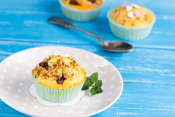 Fresh muffins with nuts and chocolate