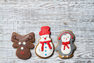 Delicious cookies for Christmas. Biscuit snowman. On a wooden table, top view