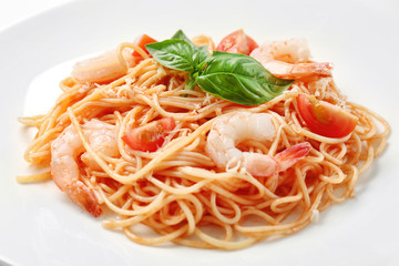 Plate of tasty pasta with shrimps, closeup