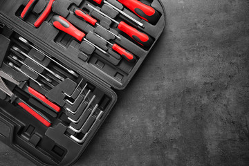Fototapeta premium Set of tools in box on gray background