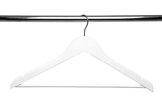 White Wooden clothes hanger on metal crossbar isolated over white.