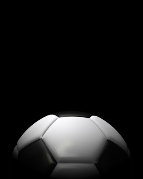 Soccer football against a black background. 3D Rendering