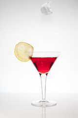 red cocktail with citron
