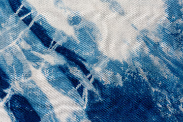 The fabric indigo tie dye as a background and texture.