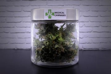Medicinal marijuana buds in glass jar