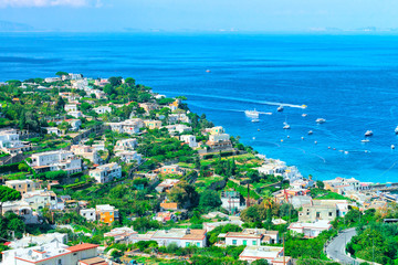 Naklejka premium Aerial view on ships at Capri Island in Tyrrhenian sea