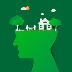 Human head with green house and happy family. Head thinking family. Family with children in the house. Couple standing outside new home.  paper art and craft style.