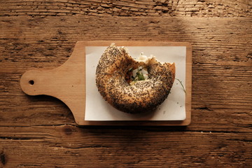 bitten bagel on a table