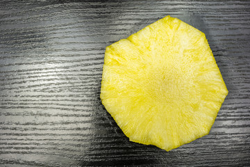 Slice of pineapple top view.
