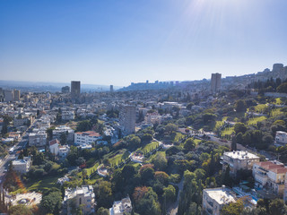 Fototapeta na wymiar Bahai, Báb and Bahá'í gardens and temple on the slopes of the Carmel Mountain, Street view of the Mediterranean Port of Haifa, Israel