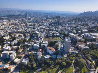 Fototapeta na wymiar Bahai, Báb and Bahá'í gardens and temple on the slopes of the Carmel Mountain, Street view of the Mediterranean Port of Haifa, Israel