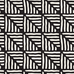 Hand drawn style ethnic seamless pattern. Abstract geometric tiling background in black and white.