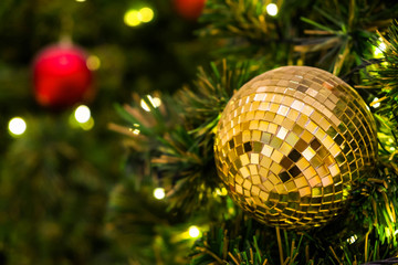 Disco ball christmas hanging on christmas tree