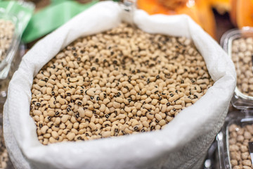 Soy beans in a bag on a local farmer market.  Healthy local food market concept..