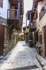Fototapeta na wymiar A narrow street in mountain village