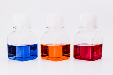 Chemical tubes and flasks with colorful liquids and reagents. Medical laboratory research. drug...