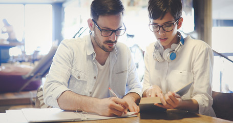 Young students studying in library