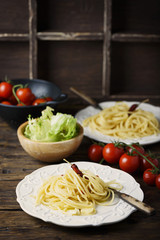Italian pasta spaghetti with oil, garlic and chili, selective focus