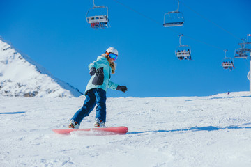 Snowboarder in the mountains 