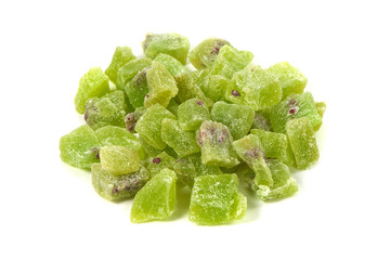 Dried pieces of kiwi, close-up, isolated on white background.