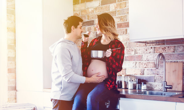 Young pregnant woman with partner