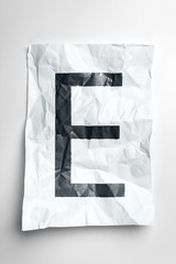 Grunge wrinkled paper letters on white background