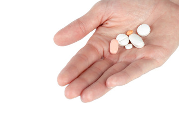 pills in woman hand