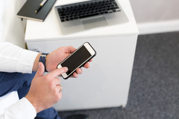 Mature businessman in a hotel room