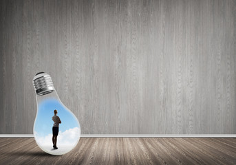 Businesswoman trapped in bulb