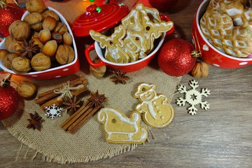 Cookies, gingerbread, nuts and spices. Christmas sweets and nuts. Christmas time 
