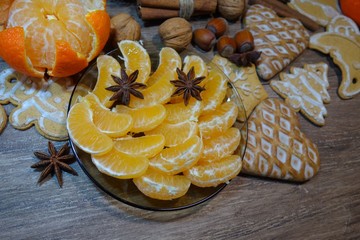 Juicy peel ed tangerines on a plate on Christmas.Still life, food and drink, seasonal and holidays concept
 