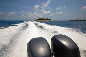 Tail of the sea from the speed boat on a sunny day on Maldives