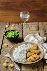 Baked Parmesan Parsley Crusted Chicken with rice